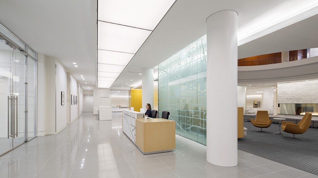 A person sitting at a desk in an office.